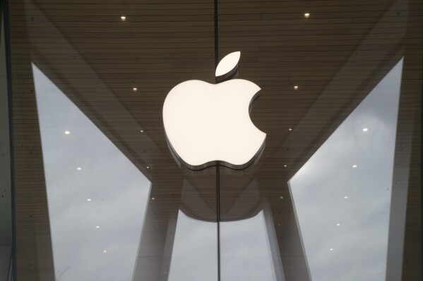 FILE - The Apple logo is displayed at an Apple store, Jan. 3, 2019. Workers at the first Apple Store to unionize in Towson, Md., have now also authorized a first strike against the tech giant’s retail operations. (AP Photo/Mary Altaffer, File)