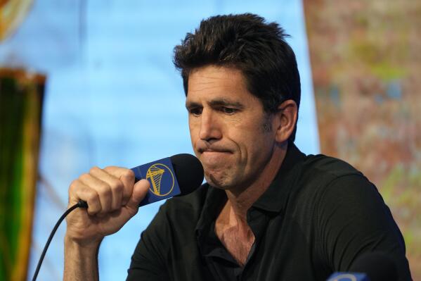 Golden State Warriors president and general manager Bob Myers makes a statement during an NBA basketball news conference in San Francisco, Tuesday, May 30, 2023. Myers is departing the Warriors after building a championship team that captured four titles in an eight-year span. One of the most successful GMs over the past decade in any sport, Myers' contract was set to expire in late June. (AP Photo/Eric Risberg)