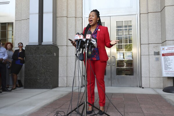 FILE - Attorney Monique Worrell, of the 9th Judicial Circuit, speaks during a news conference, Aug. 9, 2023, outside her former office in the Orange County Courthouse complex in Orlando, Fla. Gov. Ron DeSantis exceeded his authority when he removed Worrell from her elected office after a teenager fatally shot a girl and a news reporter, her attorney told the Supreme Court on Wednesday, Dec. 6. (Ricardo Ramirez Buxeda/Orlando Sentinel via AP, File)
