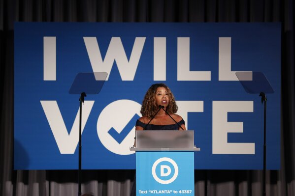 FILE - In this Thursday, June 6, 2019 file photo, Rep. Lucy McBath, D-Ga., speaks during the "I Will Vote" Fundraising Gala in Atlanta. Among voters in the 2018 midterm elections, AP VoteCast shows that Black women were more likely than women in any other racial or ethnic group to support Democratic House candidates, and their support for Democrats was also somewhat higher than among Black men. (AP Photo/John Bazemore)