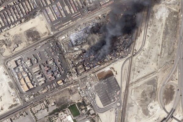 Iran says fireplace extinguished at a port rocked through explosion because the demise toll rises to a minimum of 70
