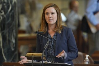 In this May 15, 2019, file photo, Sen. Anna Wishart speaks during debate in Lincoln, Neb. Wishart is co-chair of Nebraskans for Sensible Marijuana Laws, which supports putting the legalization of medical marijuana before voters in the 2020 general election. Volunteers have gathered more than 15,000 signatures in their quest to place the issue on the ballot. (AP Photo/Nati Harnik, File)