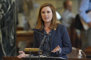 In this May 15, 2019, file photo, Sen. Anna Wishart speaks during debate in Lincoln, Neb. Wishart is co-chair of Nebraskans for Sensible Marijuana Laws, which supports putting the legalization of medical marijuana before voters in the 2020 general election. Volunteers have gathered more than 15,000 signatures in their quest to place the issue on the ballot. (AP Photo/Nati Harnik, File)