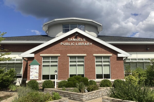 Clouds roll by the Samuels Free Library in Front Royal, Va., Monday, Sept. 11, 2023. The library that traces its roots to the 18th century could soon be shuttered over a dispute about children’s books that expose readers to gay, lesbian and transgender characters. (AP Photo/Matthew Barakat)