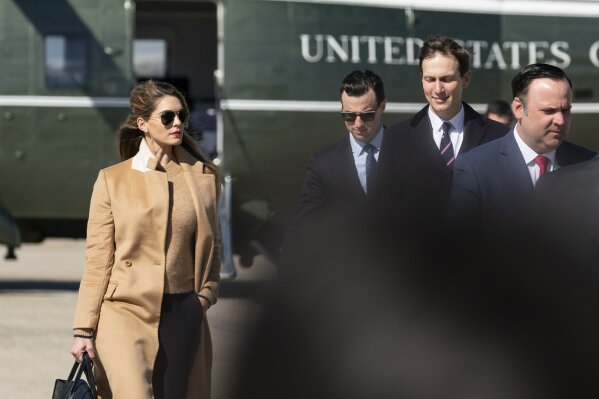 Counselor to the President Hope Hicks, left, with White House special assistant to the president Nick Luna, White House senior adviser Jared Kushner, and White House social media director Dan Scavino walk from Marine One to accompany President Donald Trump aboard Air Force One as he departs Wednesday, Sept. 30, 2020, at Andrews Air Force Base, Md. (AP Photo/Alex Brandon)