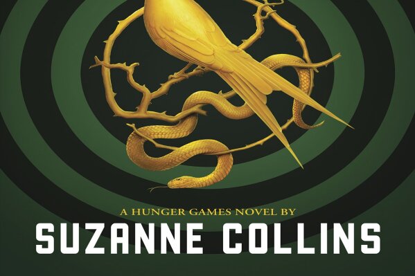 This image released by Scholastic shows "The Ballad of Songbirds and Snakes," by Suzanne Collins. The "Hunger Games" novel will be released on May 19. (Scholastic via AP)