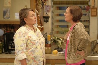 
              In this image released by ABC, Roseanne Barr, left, and Laurie Metcalf appear in a scene from the reboot of the popular comedy series "Roseanne." ABC, which canceled its "Roseanne" revival over its star's racist tweet, said Thursday, June 21, 2018, it will air a Conner family sitcom minus Roseanne Barr this fall. (Adam Rose/ABC via AP)
            