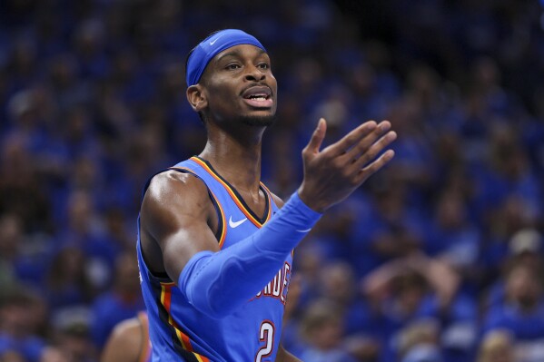 Oklahoma City Thunder guard Shai Gilgeous-Alexander reacts during the second half of Game 2 of an NBA basketball Western Conference Finals playoff series against the Minnesota Timberwolves Thursday, May 22, 2025, in Oklahoma City. (AP Photo/Nate Billings)