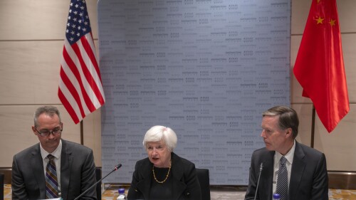 U.S. Treasury Secretary Janet Yellen, center, speaks as U.S. Ambassador to China Nicholas Burns, right, and Michael Hart, left, president of the American Chamber of Commerce in China, listen during a roundtable meeting with members of the American business community in Beijing, China, Friday, July 7, 2023. (AP Photo/Mark Schiefelbein, Pool)