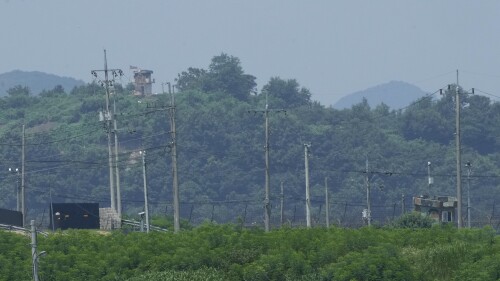 A North Korean military guard post, top left, and South Korea post, bottom right, are seen in Paju near the border with North Korea, South Korea, Wednesday, July 19, 2023. North Korea was silent about the highly unusual entry of an American soldier across the Koreas' heavily fortified border although it test-fired short-range missiles Wednesday in its latest weapons display. (AP Photo/Ahn Young-joon)