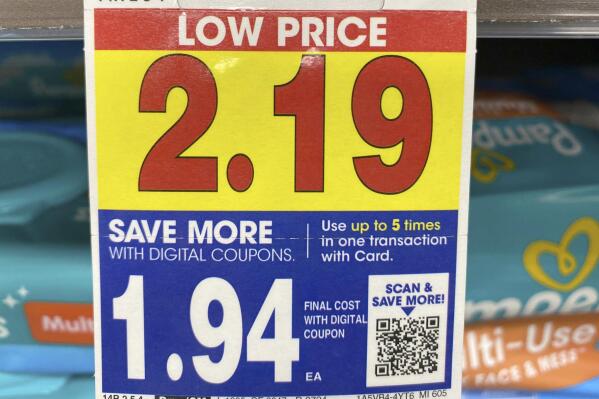 A digital-only coupon for Pampers brand baby wipes is displayed at a Kroger in Ann Arbor, Michigan, on Tuesday, Nov. 16, 2022. A coalition of consumer groups is calling on grocers to stop offering digital-only deals, saying they discriminate against people without smartphones or regular internet access.(AP Photo/Dee-Ann Durbin)