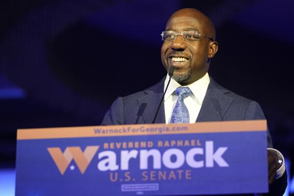 Democratic Sen. Raphael Warnock speaks during an election night watch party on Tuesday, Nov. 8, 2022, in Atlanta. (AP Photo/John Bazemore)