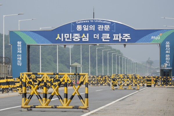 Barricades are placed near the Unification Bridge, which leads to the Panmunjom in the Demilitarized Zone in Paju, South Korea, Tuesday, June 11, 2024. South Korean soldiers fired warning shots after North Korean troops briefly violated the tense border earlier this week, South Korea's military said Tuesday, as the rivals are embroiled in Cold War-style campaigns like balloon launches and propaganda broadcasts. (AP Photo/Lee Jin-man)