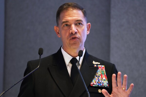 U.S. Navy Vice Adm. Brad Cooper, speaks at an event at the International Defense Exhibition and Conference in Abu Dhabi, United Arab Emirates, Feb. 21, 2023. (AP Photo/Jon Gambrell, File)