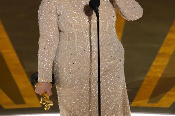 Jamie Lee Curtis reacts as she accepts the award for best performance by an actress in a supporting role for "Everything Everywhere All at Once" at the Oscars on Sunday, March 12, 2023, at the Dolby Theatre in Los Angeles. (AP Photo/Chris Pizzello)