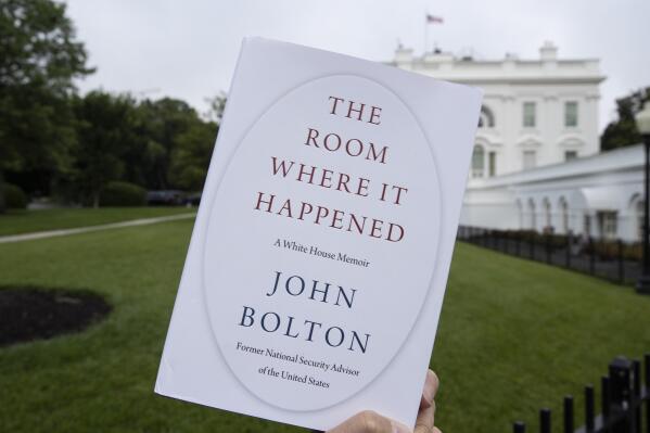 FILE - In this June 18, 2020, file photo a copy of "The Room Where It Happened," by former national security adviser John Bolton, is photographed at the White House in Washington. (AP Photo/Alex Brandon, File)