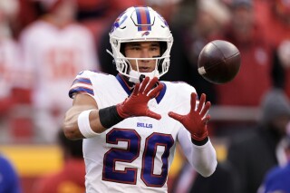 FILE - Buffalo Bills safety Taylor Rapp warms up before an NFL football game against the Kansas City Chiefs, Sunday, Dec. 10, 2023, in Kansas City, Mo. The Bills began addressing their secondary needs by re-signing Rapp to a three-year contract extension on Friday, March 8, 2024, days before he was eligible to become a free agent. (AP Photo/Charlie Riedel, File)