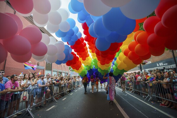 FILE - Revelers participate in the NYC Pride March, Sunday, June 25, 2023, in New York. (AP Photo/Eduardo Munoz Alvarez, File)