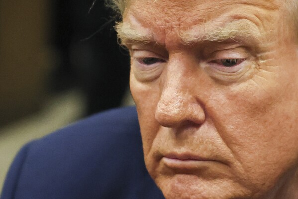 Republican presidential candidate and former President Donald Trump sits in Manhattan state court in New York, Monday, April 23, 2024. (Brendan McDermid/Pool Photo via AP)