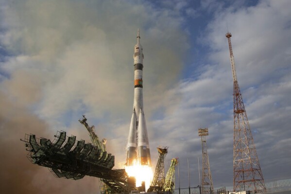In this photo released by Roscosmos space corporation, the Soyuz 2.1a rocket with Soyuz MS-25 spacecraft carrying NASA astronaut Tracy Dyson, Oleg Novitsky of Roscosmos and Marina Vasilevskaya of Belarus to the International Space Station, ISS, lifts off from the Russian-leased Baikonur launch facility in Kazakhstan, Saturday, March 23, 2024. The crew's launch was initially scheduled for Thursday, but it was aborted by an automatic safety system about 20 seconds before the scheduled liftoff. Officials said the launch abort was triggered by a voltage drop in a power source. (Natalya Berezhnaya, Roscosmos space corporation via AP)