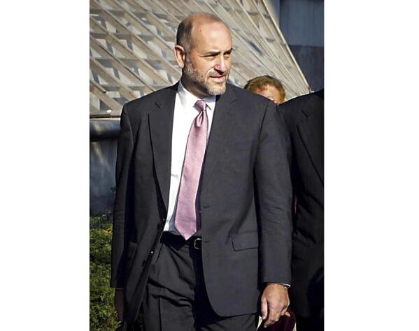 FILE — Attorney Mark Pomerantz arrives at Federal Court in New York, Aug. 12, 2002. Pomerantz, one of two prosecutors in charge of the Manhattan district attorney's criminal investigation into former President Donald Trump, have suddenly resigned throwing the future of the probe into question. (AP Photo/David Karp, File)