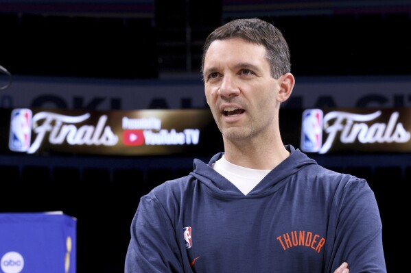 Oklahoma City Thunder coach Mark Daigneault speaks on the court after a news conference, Wednesday, June 4, 2025, ahead of Game 1 of the NBA Finals basketball series against the Indiana Pacers in Oklahoma City. (AP Photo/Nate Billings)