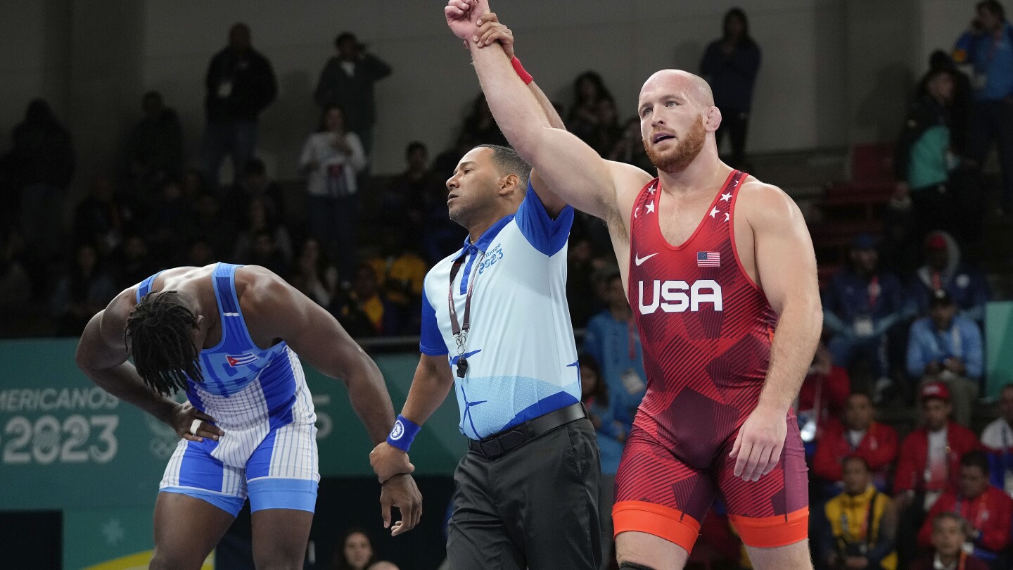 Wrestling gold medalist Kyle Snyder charged in prostitution sting