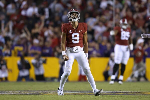 Alabama quarterback Bryce Young (9) celebrates after throwing a pass for a touchdown during the second half of the team's NCAA college football game against LSU in Baton Rouge, La., Saturday, Nov. 5, 2022. LSU won 32-31 in overtime. (AP Photo/Tyler Kaufman)