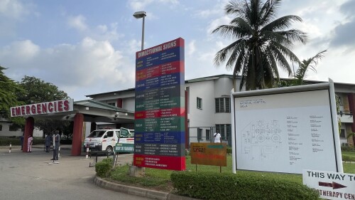 An ambulance is parked at the emergency unit of the National hospital in Abuja Nigeria, Wednesday, July. 26, 2023. The Nigerian Association of Resident Doctors on Wednesday is on strike again, demanding better working conditions for its members. (AP Photo/Chinedu Asadu)