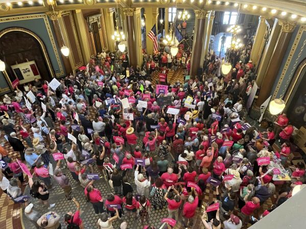 Iowa Democrat Jennifer Konfrst speaks to protesters rallying at the Iowa Capitol rotunda in opposition to the new ban on abortion after roughly six weeks of pregnancy introduced by Republican lawmakers in a special session on Tuesday, July 11, 2023. (AP Photo/Hannah Fingerhut)