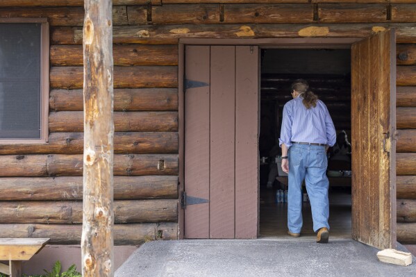 Joe Heath, general counsel for the Onondaga Nation, walks into the Nation's Longhouse for a meeting, Thursday, Aug. 3, 2023, on the Onondaga Nation territory in central New York. (AP Photo/Lauren Petracca)
