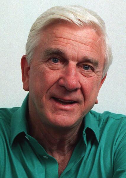 This file photo taken in November 1991, shows actor Leslie Nielsen. The Canadian-born Nielsen, who went from drama to inspired bumbling as a hapless doctor in "Airplane!" and the accident-prone detective Frank Drebin in "The Naked Gun" comedies, has died. He was 84. His agent John S. Kelly says Nielsen died Sunday, Nov. 28, 2010, at a hospital near his home in Ft. Lauderdale, Fla., where he was being treated for pneumonia. (AP Photo/Doug Pizac, file)
