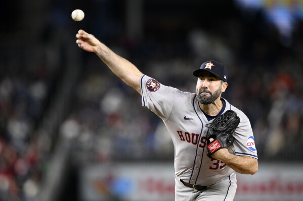 Houston Astros starting pitcher Justin Verlander throws during the fifth inning of the team's baseball game against the Washington Nationals, Friday, April 19, 2024, in Washington. (AP Photo/Nick Wass)
