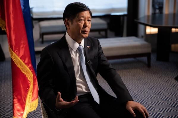 Philippine President Ferdinand Marcos Jr. speaks during an interview with The Associated Press, Friday, Sept. 23, 2022, in New York. (AP Photo/Julia Nikhinson)