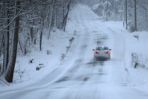 Major winter storms bring snow, ice and travel hazards to both US