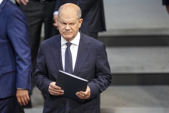 German Chancellor Olaf Scholz takes part in a Bundestag German Parliament session in Berlin Thursday, June 6, 2024. (Kay Nietfeld/dpa via AP)
