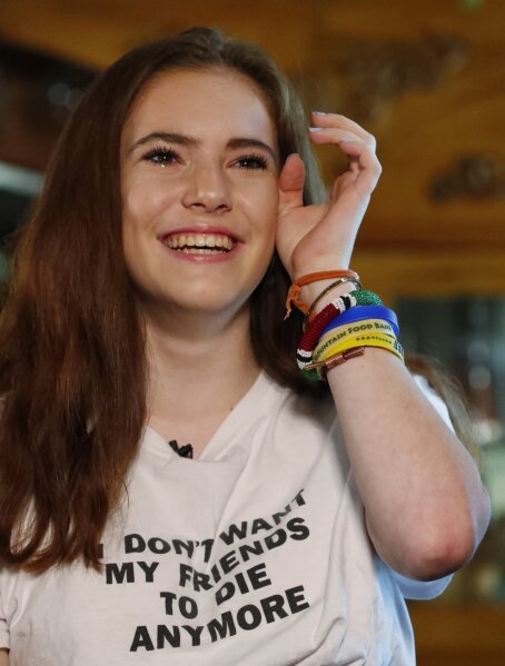 
              In this, Thursday, Feb. 7, 2019 photo, Sam Deitsch wipes a tear from her eye as she speaks during an interview with The Associated Press at her home in Parkland, Fla. Deitsch and her two brothers crisscrossed the country after the Marjory Stoneman Douglas High School massacre, helping to register young voters and advocate for stricter gun laws. (AP Photo/Wilfredo Lee)
            