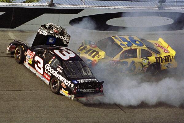 FILE - Ken Schrader (36) slams into Dale Earnhardt (3) during the Daytona 500 at the Daytona International Speedway in Daytona Beach, Fla., Feb. 18, 2001. Earnhardt was killed in the crash. NASCAR marks its 75th year in 2023, recalling both its highs and lows. (AP Photo/Glenn Smith, File)