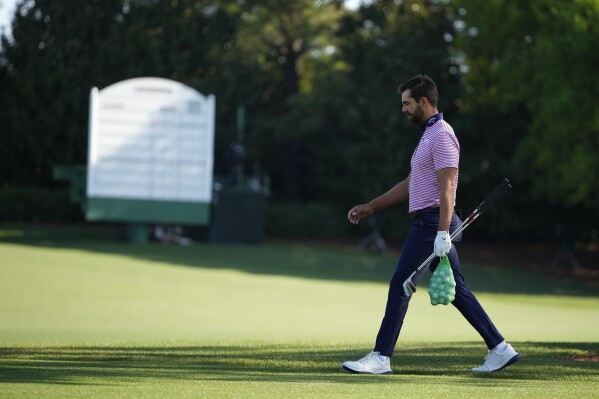 Erik van Rooyen, of South Africa, walks on the driving range during a practice round in preparation for the Masters golf tournament at Augusta National Golf Club Monday, April 8, 2024, in Augusta, Ga. (AP Photo/Matt Slocum)