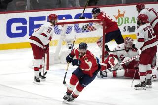 Florida Panthers left wing Matthew Tkachuk (19) reacts after scoring the game-winning goal against the Carolina Hurricanes in the waning seconds of the third period of Game 4 of the NHL hockey Stanley Cup Eastern Conference finals Wednesday, May 24, 2023, in Sunrise, Fla. (AP Photo/Lynne Sladky)