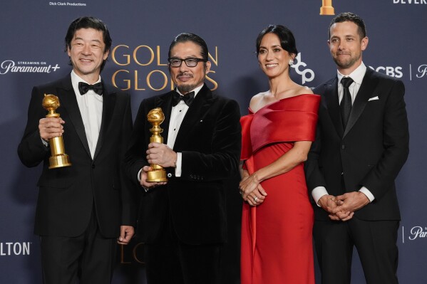 Tadanobu Asano, from left, Hiroyuki Sanada, Rachel Kondo and Justin Marks pose in the press room with the award for best television series - drama for "Shogun" during the 82nd Golden Globes on Sunday, Jan. 5, 2025, at the Beverly Hilton in Beverly Hills, Calif. (AP Photo/Chris Pizzello)