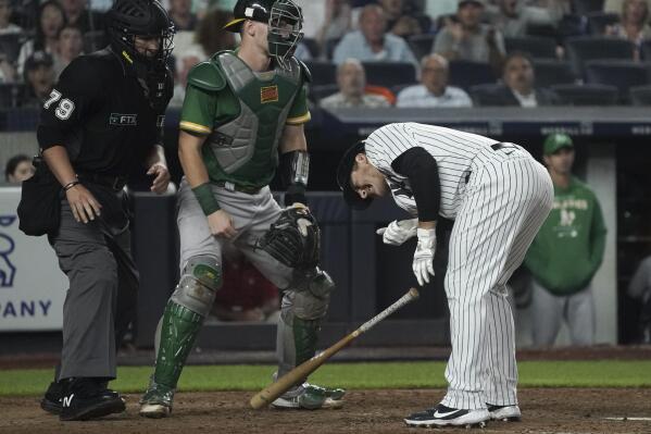 Best-in-MLB Yanks top worst-in-majors A's 9-5 on late rally