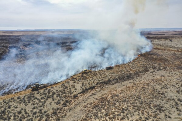 Firefighters battle the Smokehouse Creek Fire north of Canadian, Texas, Wednesday, Feb. 28, 2024 (APPhoto/David Erickson)