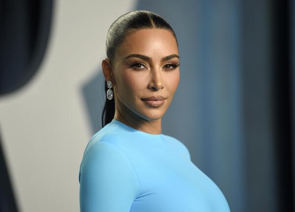 FILE - Kim Kardashian appears at the Vanity Fair Oscar Party in Beverly Hills, Calif., on March 27, 2022. Kim Kardashian testified Tuesday, April 26, 2022, that she had no memory of making any attempt to kill the reality show that starred her brother Rob Kardashian and his fiancée Blac Chyna. (Photo by Evan Agostini/Invision/AP, File)
