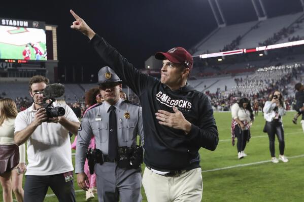 South Carolina coach Shane Beamer acknowledges the fans after the team's win over Texas A&M in an NCAA college football game Saturday, Oct. 22, 2022, in Columbia, S.C. (AP Photo/Artie Walker Jr.)