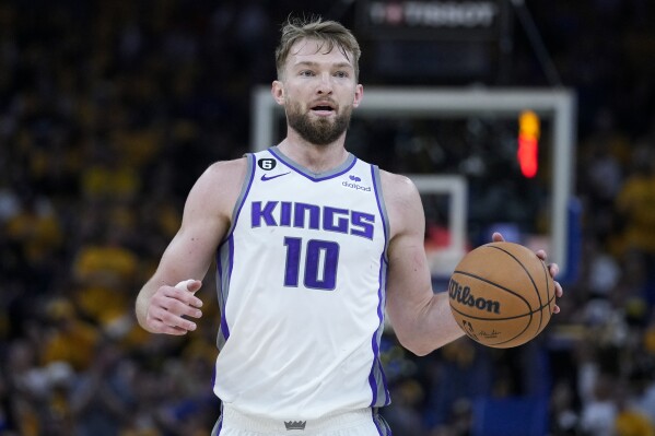 Sacramento Kings center Domantas Sabonis against the Golden State Warriors during the first half of Game 6 in the first round of the NBA basketball playoffs in San Francisco, Friday, April 28, 2023. Sabonis and the Sacramento Kings have agreed on a four-year contract extension, a person with knowledge told The Associated Press on Sunday, July 2, 2023. (AP Photo/Godofredo A. Vásquez)