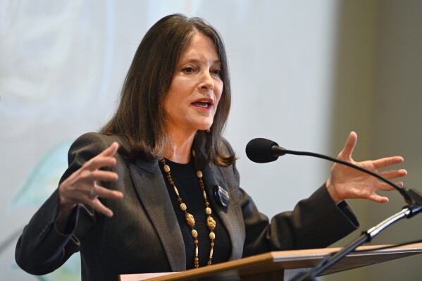 Democratic presidential candidate Marianne Williamson addresses the crowd at The Interfaith Center for Spiritual Growth, Sunday, Sept. 10, 2023, in Ann Arbor, Mich. She is running against a sitting president from her own party, and the Democratic establishment has closed ranks behind Joe Biden. (AP Photo/Jose Juarez)