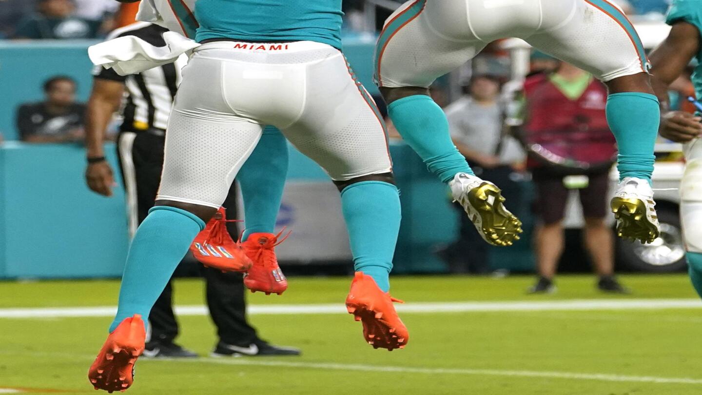 Michel, Sanu highlight wave of Dolphins roster cuts AP News