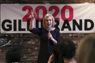 In this April 5, 2019, photo, Democratic presidential candidate Sen. Kirsten Gillibrand, D-N.Y., addresses a gathering during a campaign stop at a coffee house in Dover, N.H. Gillibrand has campaigned across eight states, pushed her rivals to release their tax returns and delivered a major speech outside a Trump-branded property in Manhattan in the months since launching her exploratory committee. Yet, she has struggled to break out of the pack of more than a dozen 2020 presidential candidates. (AP Photo/Charles Krupa)