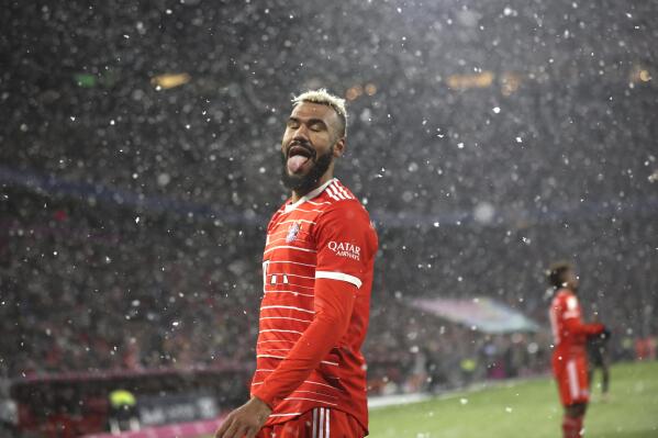 Bayern's Eric Maxim Choupo-Moting responds to snow during the Bundesliga soccer match between Bayern Munich and Union Berlin at the Allianz Arena in Munich, Germany, Sunday, Feb.26, 2023. (AP Photo/Alexandra Beier )